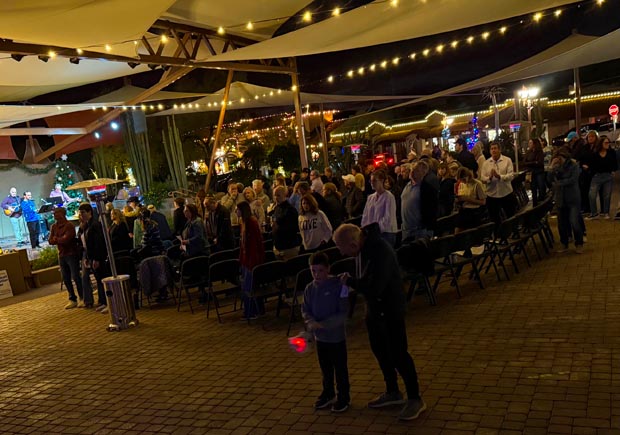 evening-crowd-string-lights-chanukah-in-carefree-2025