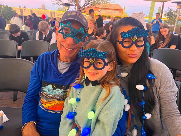family-menorah-glasses-chanukah-in-carefree-2025