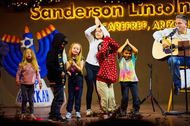 kids-dancing-on-stage-chanukah-in-carefree-2025