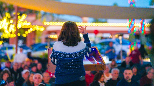 speaker-addressing-crowd-chanukah-in-carefree-2025